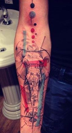 an elephant is shown on the leg and it's colors are red, blue, green