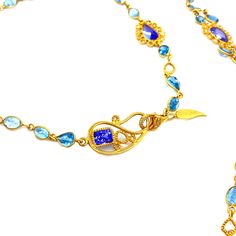 Affinity 20 Karat Yellow Gold Necklace Set with Aquamarine, Tanzanite, and Diamonds. 2.64cts diamonds 19.05cts tanzanite 33.24cts aquamarine 20K yellow gold Weight: 33.015 grams Length: 33.5 inches Luxury Gold Tanzanite Necklaces, Luxury Gold Tanzanite Necklace, Jewelry 2024, Tanzanite Necklace, Ancient Roman Glass, Tiktok Shop, Yellow Gold Necklace, Sterling Silver Rings Bands, Gold Necklace Set