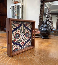 a wooden frame sitting on top of a table