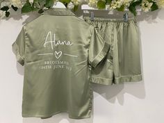 **Thank you so much for visiting our Etsy Shop** We have lots of Robes, Pyjamas, Sleepshirts and cami sets in various styles, sizes, materials colours and designs Can't see what you are looking for?....You can find our smaller sizes and our full collection over on our website:  https://www.avaappleblossom.co.uk Our luxuriously soft pyjamas are perfect for Weddings, Hen Parties or Spa Days and they also make gorgeous gifts for birthdays and special occasions. A beautiful gift for your bridal party for getting ready on the big day.  Made from 100% soft polyester satin fabric our pyjamas feature contrasting piping and delicate button detail. With elasticated waistband, these semi-fitted pyjamas combine both comfort and style and look flattering on all body shapes. DESIGNS We have lots of desi Green Pyjamas, Luxury Pyjamas, Bridal Party Pajamas, Theme Nights, Bachelorette Theme, Monogrammed Pajamas, Satin Pyjama, Pyjama Party, Spa Days