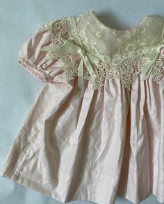 Stunning Vintage 90's Baby Dress - Size 6 months No tag but feels like cotton, lace bib with bows in excellent condition Cotton Baptism Dress With Lace Collar, Cute Cotton Dress With Lace Collar, Cotton Dress With Lace Collar For Baptism, Pink Cotton Dress With Lace Collar, Short Sleeve Cotton Dresses With Lace Work, Cotton Dresses With Lace Work And Short Sleeves, Vintage Baby Dress, Vintage Baby Dresses, Baby Girls Dresses