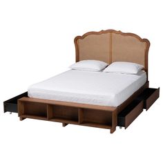 a bed with two drawers underneath it and a headboard on the bottom half of the bed