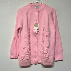 New With Tags. Excellent New Condition. Fits Small-Medium. No Shoulder Seams. Armpits 20” Length 26” Winter Pink Cardigan With Floral Embroidery, Pink Floral Embroidered Winter Cardigan, Pink Floral Embroidery Cardigan For Winter, Pink Winter Tops For Daywear, Pink Winter Daywear Tops, Pink Tops For Winter Daywear, Vintage Closet, Embroidered Cardigan, Pink Cardigan