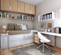 a bedroom with a bed, desk and bookshelves on the shelves above it