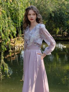 The blouse and skirt resemble morning mist, with the soft sunlight filtering through, slowly announcing the approach of dawn.
 The skirt's delicate color is reminiscent of a lotus blooming in the morning dew.
 It's a transparent setup that exudes a mysterious atmosphere and seems as if it could disappear at any moment.

 ＜Item＞


 blouse

 Strap Skirt




 <Size>


 blouse



 Small size



 Length: 54cm

 Shoulder width: 35cm

 Bust: 90cm

 Waist: 90cm

 Sleeve length: 60cm




 Medium size Elegant Lavender Skirt For Spring, Formal Purple Summer Blouse, Elegant Purple Chiffon Blouse, Elegant Lavender V-neck Blouse, Elegant Lavender Blouse For Spring, Lotus Blooming, Light Purple Flowers, Strap Skirt, Morning Mist