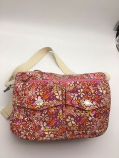 Levi’s PInk Floral Canvas messenger bag/shoulder bag purse VGUC. Cute shoulder bag from Levi’s has snap pockets on the front and zip pockets on the inside. It measures 13” wide x 9.5” tall and 4” Dee; Drop on the adjustable strap is 13” as shown. Orange cotton lining and creme colored webbed strap. Email with questions before you buy…..thanks for visiting my store. Retro Crossbody Bags With Pockets, Retro Crossbody Shoulder Bag With Zipper Pocket, Retro Shoulder Bag With Pockets, Retro Satchel Shoulder Bag With Pockets, Vintage Crossbody Bag With Pockets, Retro Crossbody Shoulder Bag With Pockets, Retro Satchel With Pockets For Daily Use, Retro Satchel Bag With Pockets, Retro Everyday Satchel With Pockets