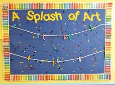 a splash of art bulletin board with colorful paper streamers and colored crayons