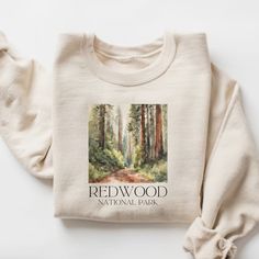 Redwood National Park Shirt, Hiker Gift, Redwood Shirt, National Park Shirt, Redwood National, Adventure Shirt,Family Trip Shirt, Forest Tee HOW TO ORDER T-SHIRT  1- Please check and review all photos 2- Choose your size from the drop-down menu and add each shirt to your cart one at a time. 3- Select your shirt color from drop-down menu 4- Finally, your custom shirt will be ready to ship 2-5 business days. Holiday times may affect the processing times. -Our shirts are made to order specially for you. Because of this reason, we don't accept returns or exchanges. Please check our color and size charts before you place your order. If you have any questions, please send us a message to clarify sizing or colors. Product Information Sweatshirts and Hoodies are made of 50% cotton and 50% polyeste National Park T Shirt, National Park Merch, National Park Logo, National Park Tshirt, National Park Shirt, Redwood National Park, Halloween Moms, Hiker Gifts, Adventure Shirt