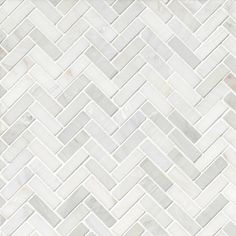 a white marble herringle tile pattern