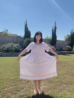 This is a beautiful vintage-looking white dress! The fabric is made from a soft cotton bed sheet (new condition). The sleeves are made from a pillowcase and have gorgeous golden embroidery. Wearing this dress feels like you are in cozy bed :)  - Top bodice is fully lined. - The skirt has an inner fabric. - There is a waist tie. - Bust 39in / Waist 44in / Length 43.5in Model size: Height 5.2ft / Bust 30 in / Waist 26 in Return & Refund Thank you for supporting one women business! As I'm an independent artist, I'm unable to afford a return/refund at this moment. Please read the item description and size before you make a purchase. Thank you for understanding! Love the product but can't find your size? Please visit my website www.yeppistudio.com for more fabric options and made-to-order/pre-o White Vintage Dress For Garden Party With Short Sleeves, White Vintage Dress With Short Sleeves For Garden Party, White Short Sleeve Vintage Dress For Garden Party, White Pastoral Dress For Daywear, White Cotton Peasant Dress For Spring, White Cotton Feminine Vintage Dress, White Feminine Vintage Cotton Dress, White Midi-length Cottagecore Vintage Dress, White Midi Length Cottagecore Vintage Dress