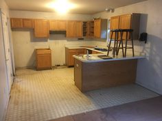 an empty kitchen is shown in the middle of being remodeled with new cabinets and counter tops