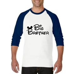 a man wearing a white and blue baseball shirt with the words,'be brother'printed on it