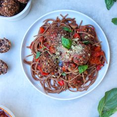 spaghetti and meatballs with basil on top is featured in the cover of this vegetarian gluten free recipe