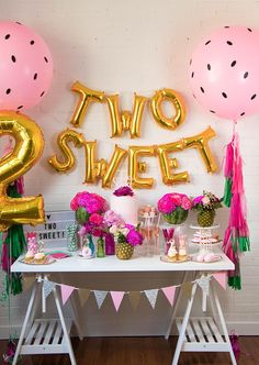 two sweet birthday party with balloons and decorations