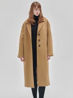 Editor's NotesA basic coat with a simple and neat silhouette that is easy to match with a variety of looks. Featuring the Notch lapel, dropped shoulder and three-button closure.- Midi length- Notch lapel- Button closure- Back slitMeasurements(in.)Size: Middle / Long- Sleeve length: 29.1 / 29.1 in.- Chest: 22 / 22 in.- Sleeve circumference: 9.4 / 9.4 in.- Sleeve width: 7 / 7 in.- Length: 42.5 / 45.2 in.*The unit of measurement is based on the cross-section, and there may be an error of approximately ±5% depending on the product.*Errors may occur depending on the measurement method and location.*Model info:TARA: Height 5'9 / Bust 29.9 in. / Waist 22.8 in. / Hip 34.2 in.LIZA CHERYN: Height 5'8 / Bust 33.4 in. / Waist 24 in. / Hip 35.4 in.ARINA SERBUL: Height 5'6 / Bust 30.7 in. / Waist 22.8 i Modern Structured Outerwear With Single Button, Modern Structured Single Button Outerwear, Oversized Single Button Outerwear, Structured Single Button Outerwear For Fall, Fall Structured Single Button Outerwear, Fall Structured Single-button Outerwear, Basic Coat, Cross Section, Units Of Measurement