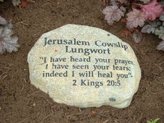 a memorial stone with the words jesusen cowslip lungwort written on it