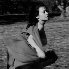 black and white photograph of a woman in motion