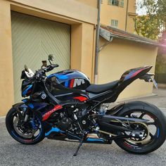 a motorcycle parked in front of a garage