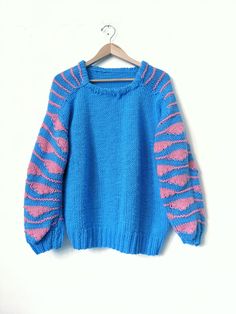 Vintage Knit Pattern Retro 3D Pink Blue Crewneck Pullover Sweater Colorful No label: fits like a Large L 27" in. C 23" in. Pit to pit. S 19" in. Put to cuff. Good condition. Blue Knitted Acrylic Tops, Blue Knit Long Sleeve Sweatshirt, Blue Acrylic Sweater For Fall, Blue Knit Sweatshirt For Fall, Knitted Acrylic Crew Neck Sweatshirt, Blue Knit Crew Neck Sweater, Blue Knit Crew Neck Sweatshirt, Pink Knitted Long Sleeve Top, Oversized Blue Crew Neck Sweater