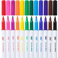 many different colored markers are lined up in the same row and on each side, there is