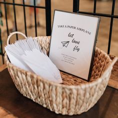 a basket that has some papers in it