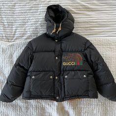 Authentic Gucci X Northface Black Puffer From The Sold Out Collection In Size Men’s Xs. I’m A Women’s Xs And It Fits Oversized. Worn Twice, In Excellent Condition. Comes With Original Box, Dust Bag, Hanger And Tag. North Face X Gucci Puffer Jacket, Northface Black Puffer, Bag Hanger, Black Puffer, North Face Jacket, All Colors, It Fits, The North Face, Limited Time