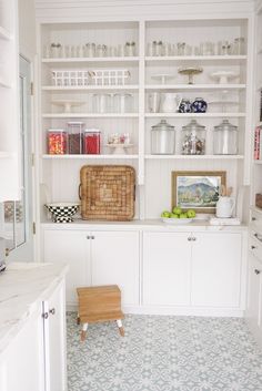 the kitchen is clean and ready to be used as a storage area for food items