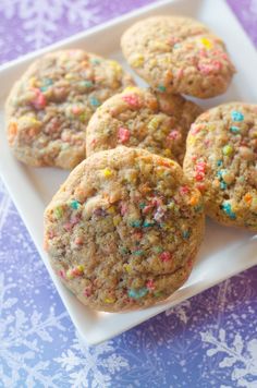 cookies with sprinkles on a white plate