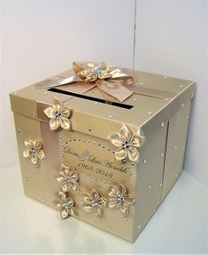 a wedding card box with flowers on it