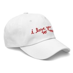 I love you so much! Based on the iconic Austin mural. ★ 100% chino cotton twill ★ Unstructured, 6-panel, low-profile ★ 6 embroidered eyelets ★ 3 ⅛" (7.6 cm) crown ★ Adjustable strap with antique buckle White Cotton Dad Hat With Letter Embroidery, White Embroidered Cotton Baseball Cap, White Embroidered Cotton Dad Hat, Cotton Dad Hat With Letter Embroidery And Flat Bill, Cotton Dad Hat With Embroidered Text, White Cotton Dad Hat With Letter Print, Trendy Embroidered Cotton Baseball Cap, Embroidered Cotton Dad Hat With Flat Brim, Trendy Embroidered Cotton Dad Hat