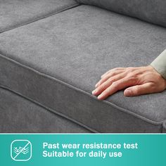 a person's hand resting on the back of a couch with text that reads, past wear resistance test suitable for daily use