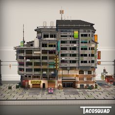 an image of a building that is made out of legos and has windows on it