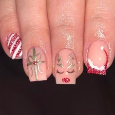 red Christmas nails: reindeer accent Nail For New Year, Birthday Nails Christmas, Chrismath Nails, Christmas Nails Red Reindeer, Christmas Nails Acrylic Reindeer, Christmas Rudolph Nails, Noche Buena Nails, Christmas Nail Art Reindeer, Easy December Nails