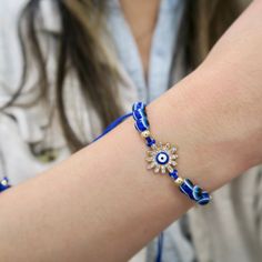 The Evil Eye charm has been used for centuries as a talisman for protection against misfortunes and malicious intent. It is thought to bring the wearer good luck.This adjustable sliding knot bracelet comes in an assortment of evil eye styles in a gold finish. Traditional Resizable Jewelry For Friendship, Adjustable Evil Eye Bracelet With Sliding Knot, Adjustable Spiritual Evil Eye Bracelet With Sliding Knot, Adjustable Bohemian Evil Eye Bracelet For Good Luck, Adjustable Jewelry With Sliding Knot For Blessing, Bohemian Evil Eye Bracelet For Good Luck, Bohemian Evil Eye Jewelry For Friendship, Adjustable Hand-strung Amulet Bracelet, Adjustable Evil Eye Beaded Bracelets For Good Luck