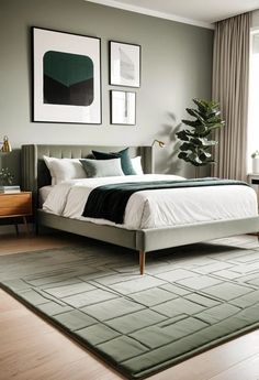 a bed sitting in a bedroom on top of a wooden floor next to a window