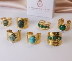 Elevate your style with our exclusive collection of gold textured rings, each set with a stunning natural gemstone. These unique, adjustable rings blend intricate textures with the natural beauty of turquoise, malachite, and other gemstones, offering a chic and sophisticated look for any occasion.   Distinctive Textures: Each ring features unique patterns, enhancing the overall design and appeal.   Natural Gemstones: Carefully selected turquoise, malachite, and other gems provide a vibrant splash of color.   Adjustable Fit: Designed to comfortably fit any finger size with an easy-to-adjust band.   Versatile Style: Perfect for daily wear or as a standout accessory for special events.   Ideal for Gifting: Comes in a beautiful packaging, ready to be gifted to someone special or to treat yours Textured Gold Ring, Unique Gold Rings, Textured Ring, Beautiful Packaging, Gold Texture, Ring Collections, Clearance Sale, Adjustable Rings, Exclusive Collection