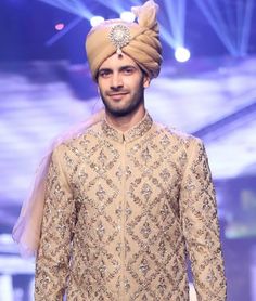 <p>High quality organza turban in pale gold color<br />Pre tied<br />Long tail</p> <p><strong>Additional Accessories:</strong> Jewellery / Embroidery Price: US$50</p> Gold Sherwani With Resham Embroidery For Party, Gold Sherwani With Intricate Embroidery For Party, Party Gold Sherwani With Intricate Embroidery, Traditional Sherwani With Gold Embroidery For Party, Gold Embroidered Sherwani For Party, Gold Sherwani With Gold Embroidery For Party, Gold Party Sherwani With Zari Work, Gold Sherwani With Zari Work For Party, Gold Sherwani For Festive Party Occasion