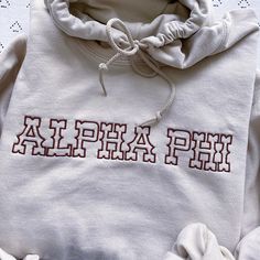 This trendy, unique, handcrafted Western Gildan embroidered hoodie sweatshirt is sure to stand out on any campus! Grab one for you, your big/little, or a group of sisters (bulk discount information can be found below). If you need some greek letter sweatshirt inspiration, please visit the inspiration page! Picture Details Pictures: ⭑ #1-2: Sand sweatshirt, Brown thread Care Instructions ⭑ Wash inside out on cold & air dry for best results ⭑ Do not dry clean ⭑ Light iron if necessary ⭑ Care instr Sweatshirt Inspiration, Sorority Family, Fraternity Letters, Boutique Tees, Light Blue Sweatshirt, Letter Hoodie, Sorority Sweatshirts, Sorority Letters, Sister Pictures