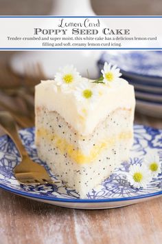 a piece of lemon cake on a blue and white plate with flowers in the middle