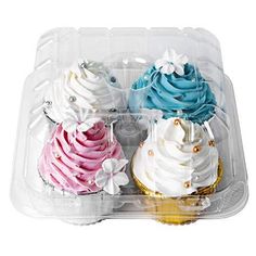 there are three cupcakes in the plastic container