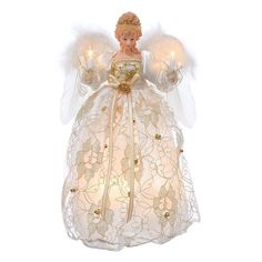 an angel figurine with white wings and gold trimmings, holding two lit candles