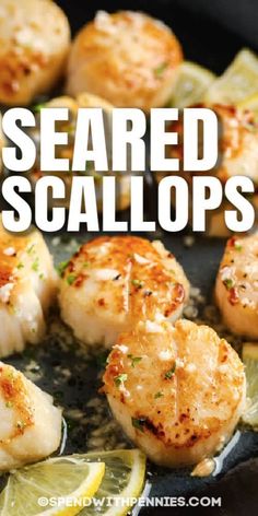 seared scallops with lemon and parsley in a cast iron skillet