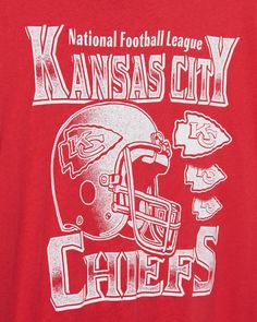 Show off your Chiefs pride in style with the Oversized Ringer Tee. Its vintage design and modern comfort make it the perfect choice for game day or casual wear. With bold team graphics and a relaxed fit, this officially licensed tee is crafted from soft, breathable fabric and features contrasting ringer details. Go Chiefs! Return Policy WE ONLY OFFER STORE CREDIT FOR RETURNS! Feel free to email us at info@shopluxxeapparel.com or DM us with any questions regarding fit, styling, or our return poli Team Shirt Designs, Vintage Kansas City, Billy Strings, Kc Football, Go Chiefs, Football Team Shirts, Match Boxes, Graphic Work, Holiday Shoes