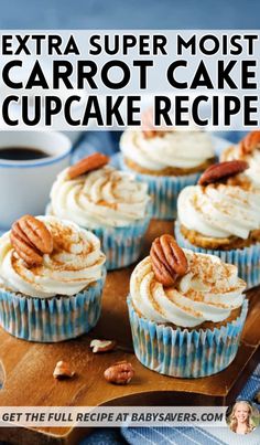 cupcakes with white frosting and pecans on a cutting board