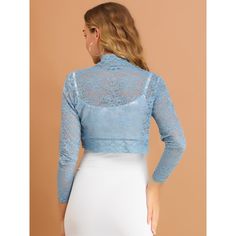 It's designed with floral lace and an open front for a comfortable fit. Crafted from soft and knit fabric, this lace cardigan features feminine full sleeves, and a scalloped hem, and is perfectly covered up with sleeveless dresses for a wedding look. A must-have item in your clothing wardrobe, the lace bolero has long sleeves, and semi-sheer lace, and is finished with a cropped length and could be stretchy a bit. Fitted Lace Cardigan For Party, Fitted Blue Tops With Lace Collar, Blue Fitted Top With Lace Collar, Fitted Lace Trim Cardigan For Layering, Fitted Lace Open Front Cardigan, Fitted Lace Cardigan With Open Front, Lace Patchwork Cardigan, Long Sleeve Lace Trim Cardigan, Long Sleeve Lace Cardigan With Lace Patchwork