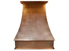 a gold colored stove hood on a white background