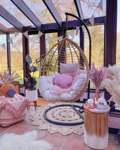 a room filled with lots of furniture and decor on top of a floor covered in fur