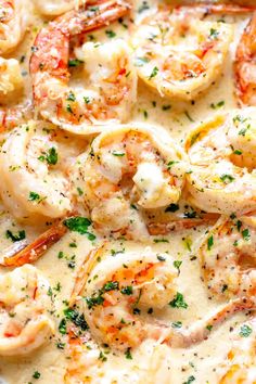 a close up of some food in a pan with broccoli and shrimp on it