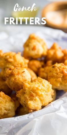 chicken fritters on a white plate with the words crunch fritters above it