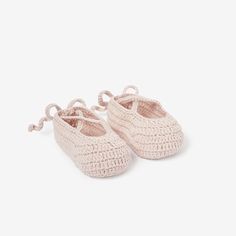 These comfortable hand-crocheted booties are the perfect slide-on shoe for every little one's tiny toes. The soft knitting feels like pillows on those sensitive baby feet. These Pink Ballerina Hand-Crocheted Baby Booties are perfect for every future ballerina.  100% cotton knit Fits 0-12 months Knit texture is a soft delight to baby's senses Matches well with Pink Cable Knit Sweater & Blanket Ballerina Hands, Crocheted Baby Booties, Sweater Blanket, Best Baby Shoes, Baby Ballet, Pink Booties, Pink Cable Knit Sweater, Crochet Shoes Pattern, Newborn Shoes